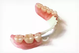 Зубные протезы Квадротти на верхнюю и нижнюю челюсть